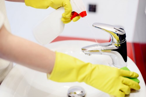 Technician reviewing a kitchen risk assessment before oven cleaning