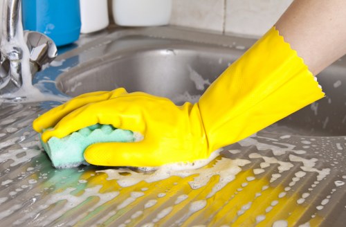 Local Richmond cleaning team working in a flat with limited access